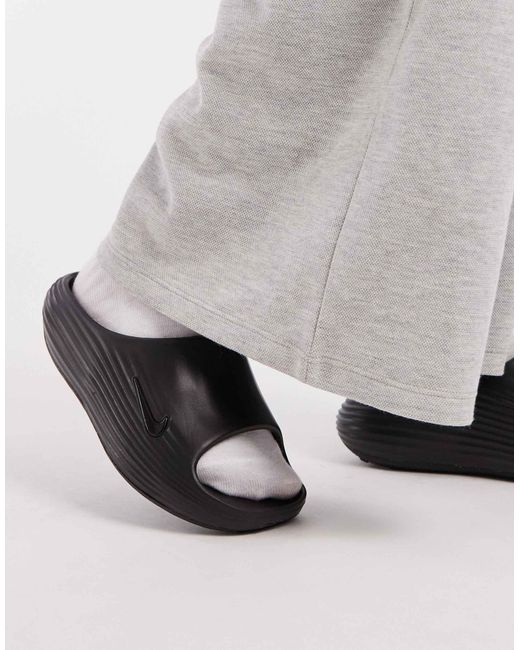 Nike Black – reactx rejuven8 – slider