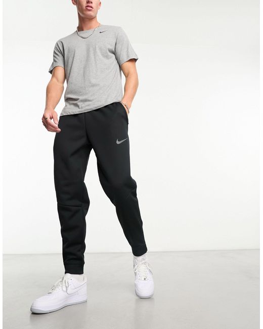 Joggers s therma-fit Nike de hombre de color Black
