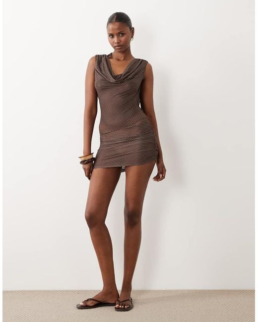 The Frolic Brown Exclusive Sheer Mesh Cowl Neck Open Back Beach Mini Dress