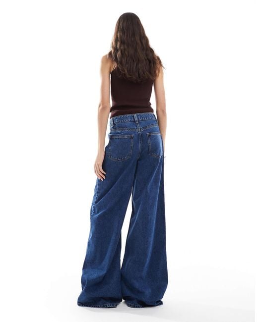 Asos design tall - jean ample à taille haute - moyen délavé ASOS en coloris Blue