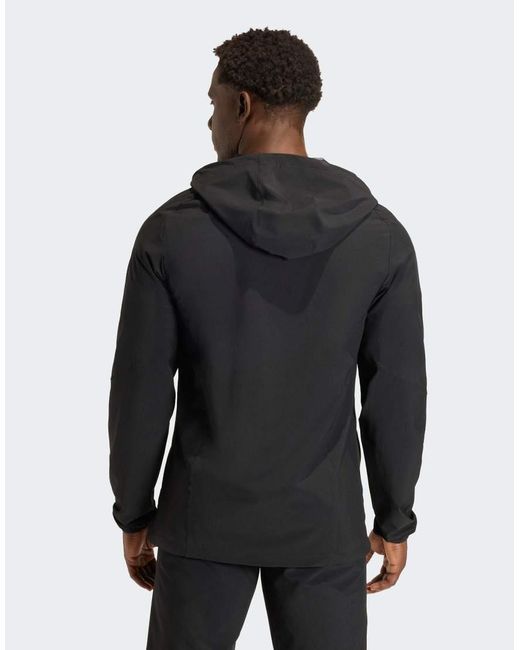 Adidas Originals Black Tiro Travel Windbreaker Jacket for men