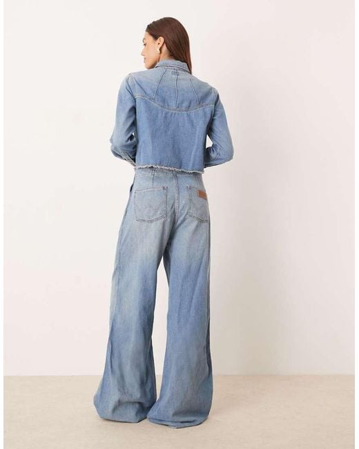 Wrangler Western Jumpsuit Met Wijde Pijpen En Onafgewerkte Zomen in het Blue