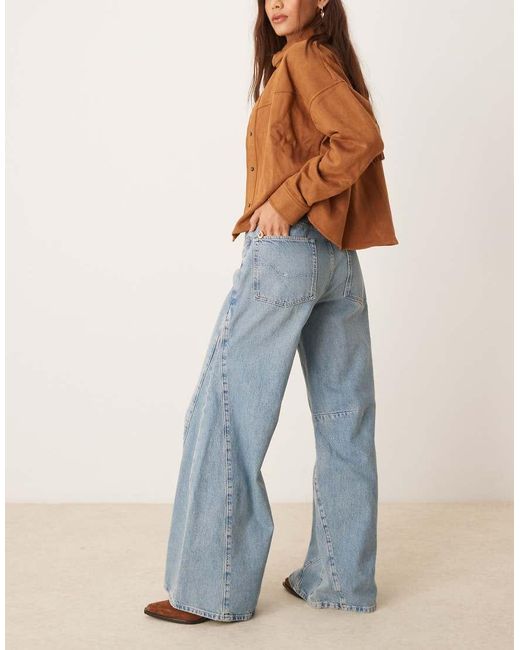 Vaqueros De Campana De Talle Alto Y Corte Holgado Con Lavado Azul Medio Eden De Free People de color Blue