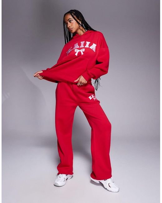 Kaiia Oversized Hoodie Met Geborduurd Striklogo in het Red