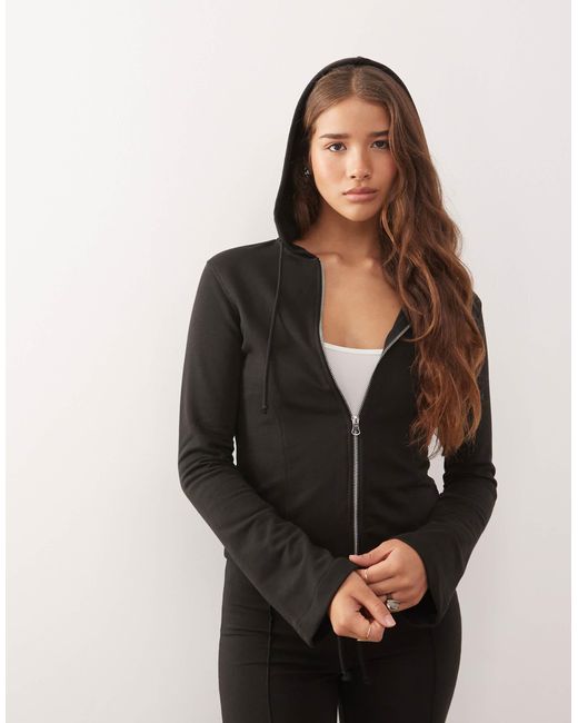 Sweat à capuche ajusté d'ensemble à manches évasées Monki en coloris Black