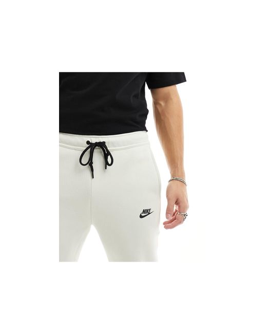 Joggers en hueso tech fleece Nike de hombre de color White
