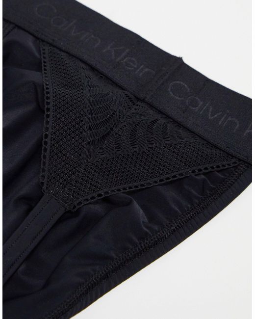 Calvin Klein – figurformender spitzen-tanga in Black für Herren