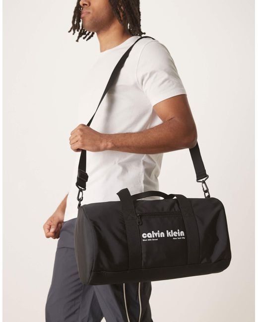Calvin Klein White Retro Logo Holdall for men