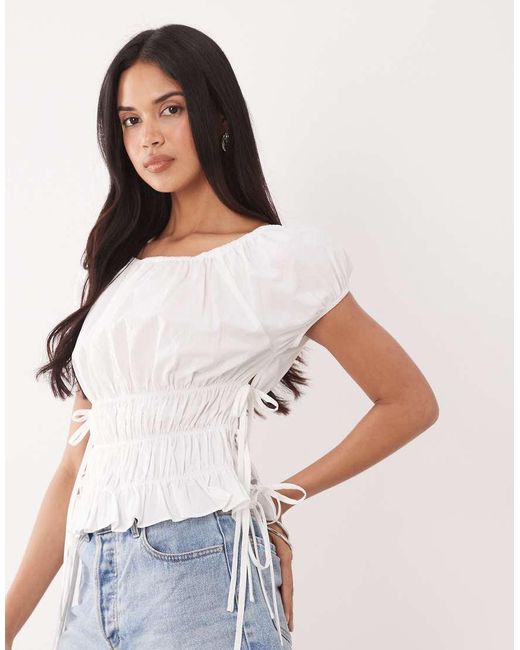 The Frolic White Exclusive Cotton Shirred Tie Side Detail Top
