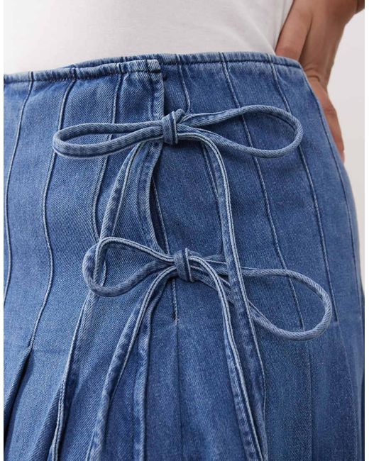 ARRANGE Blue Curve Pleated Denim Midi Skirt With Tie Detail
