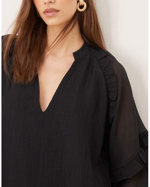 Vestito Corto A Maniche Lunghe Con Volant di Pretty Lavish in Natural