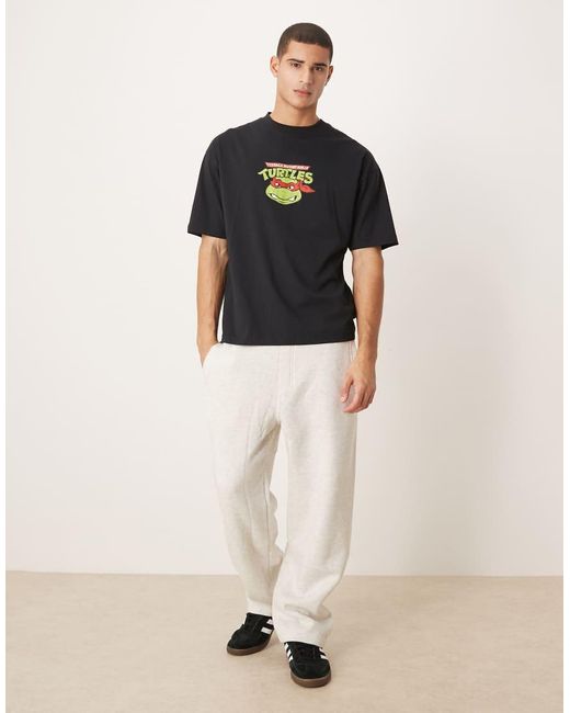 ASOS Black Oversized T-Shirt With Ninja Turtles Vintage Prints