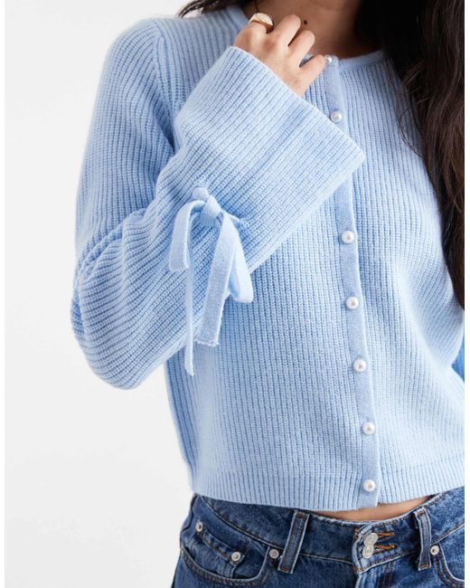 Pieces Blue Knitted Cardigan With Pearl Buttons And Bow Tie Cuffs