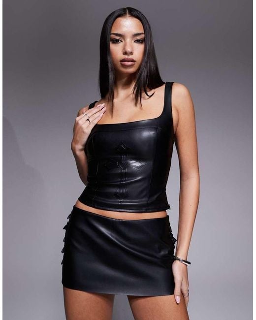I.AM.GIA Black Riva Leather Look Scoop Neck Top With Cross Detail