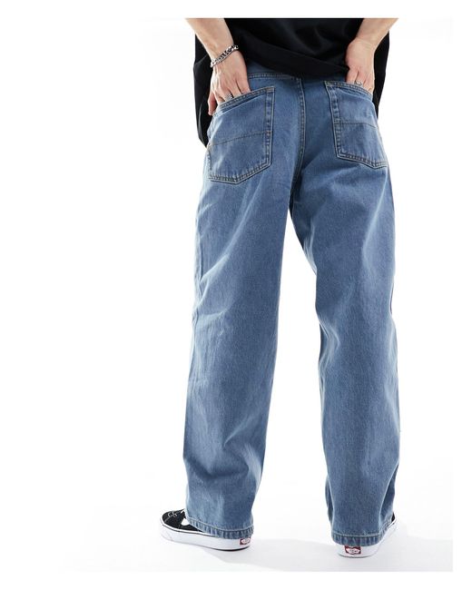 Check-5 - jeans larghi lavaggio medio di Vans in Blue da Uomo