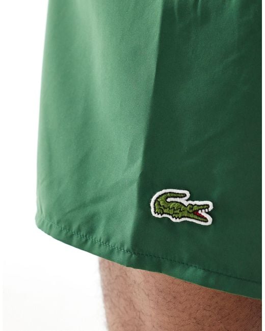 Pantaloncini da bagno color scuro con logo di Lacoste in Green da Uomo