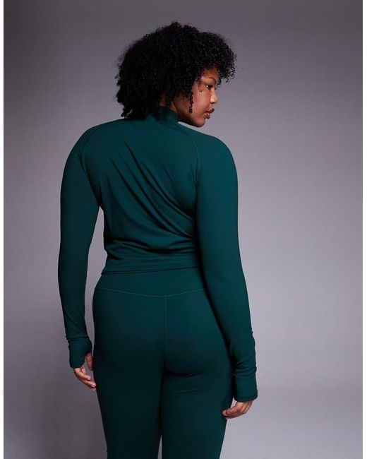 4505 Blue Curve Icon Zip Up Studio Long Sleeve Top