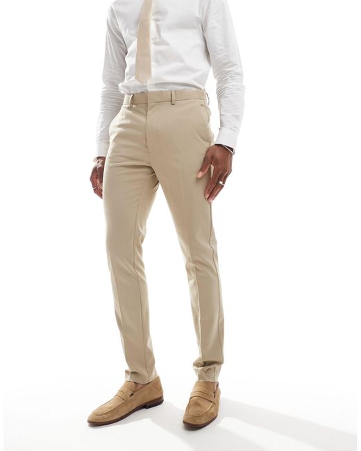 Pantaloni da abito skinny color pietra di ASOS in Natural da Uomo