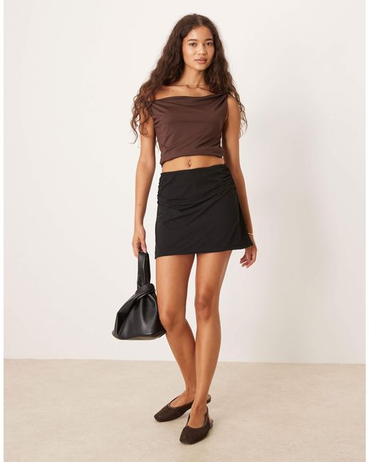 Mini-jupe en tulle à détails froncés ASOS en coloris Black