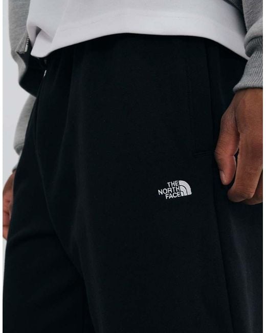 The North Face White Essential Simple Dome Relaxed Trousers for men