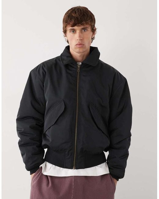 Chaqueta Bomber Negra Extragrande Con Cuello De Solapas De Weekday de hombre de color Black