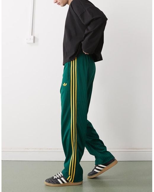 Adidas Originals Green Firebird Loose Pinstripes Track Pants for men