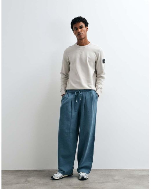 ASOS Blue Oversized Balloon joggers With Acid Wash for men