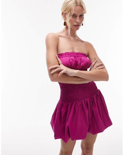 Vestido Corto Color Frambuesa Con Escote Palabra De Honor Y Cuerpo Fruncido De La Colección Con Kaia Gerber De Mango de color Purple