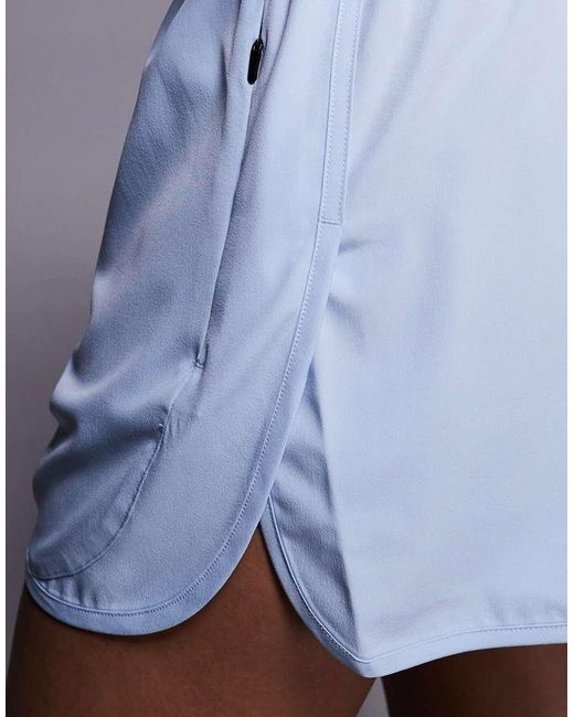 4505 Blue Curve Icon Woven Run Short With Zip Pockets