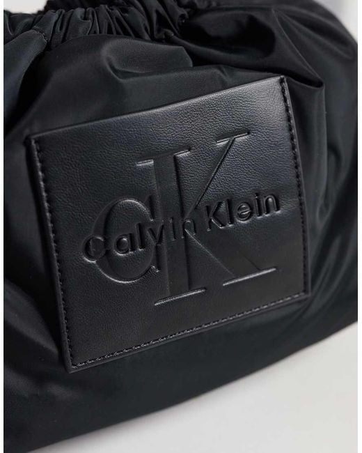 Calvin Klein Blue Nylon Drawstring Crossbody Bag With Bold Logo