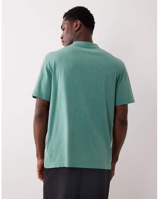 Calvin Klein Green Graphic Acid Wash T-shirt for men