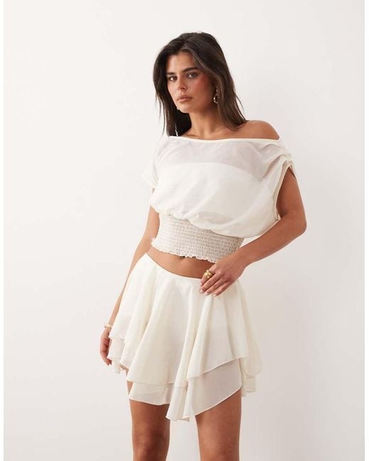 The Frolic Natural Exclusive Chiffon Asymmetric Tiered Frill Mini Skirt