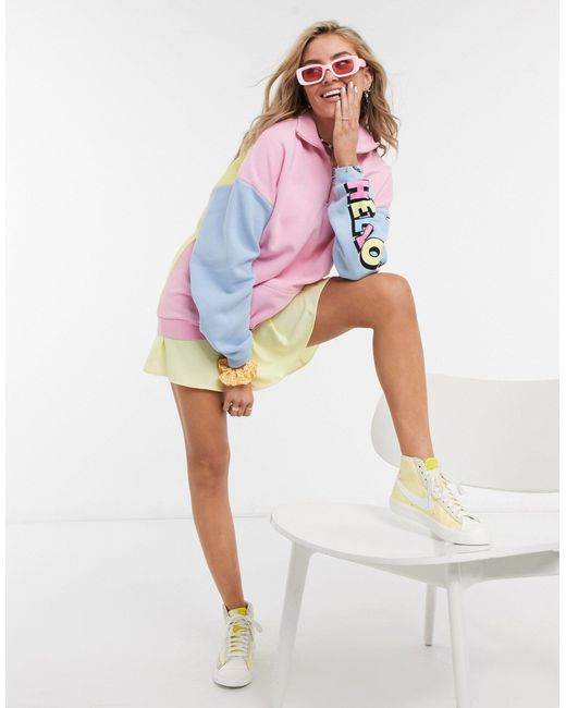 New Girl Order Multicolor X Hello Kitty – Oversize-Polo-Sweatshirt mit Farbblockdesign