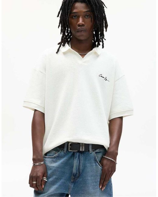 Pull&Bear Blue Knit Polo Shirt With Embroidered Slogan for men