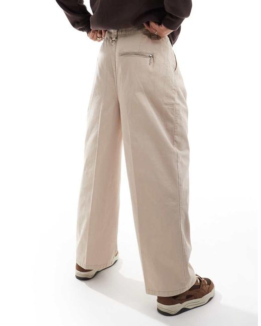 The Ragged Priest Natural Wide Fit Twill Pleat Chinos for men