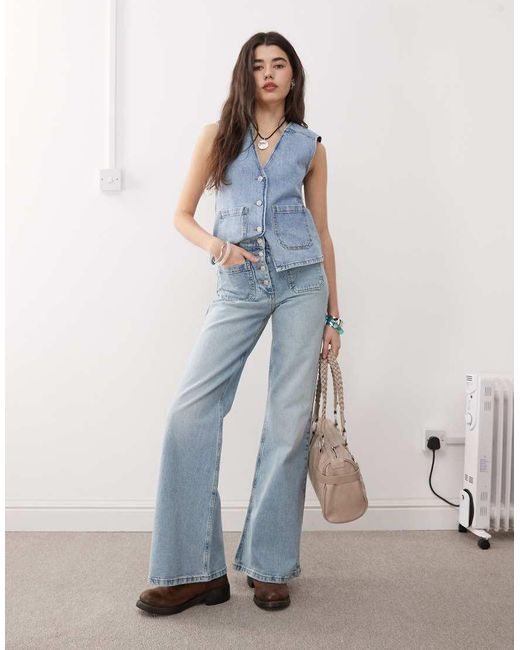 Reclaimed Vintage Blue Denim 70s Palazzo Jeans With Patch Pockets And Button Fly Detail