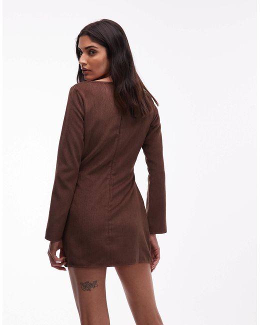 Robe virevoltante en velours côtelé à manches longues et encolure dégagée - chocolat ASOS en coloris Brown