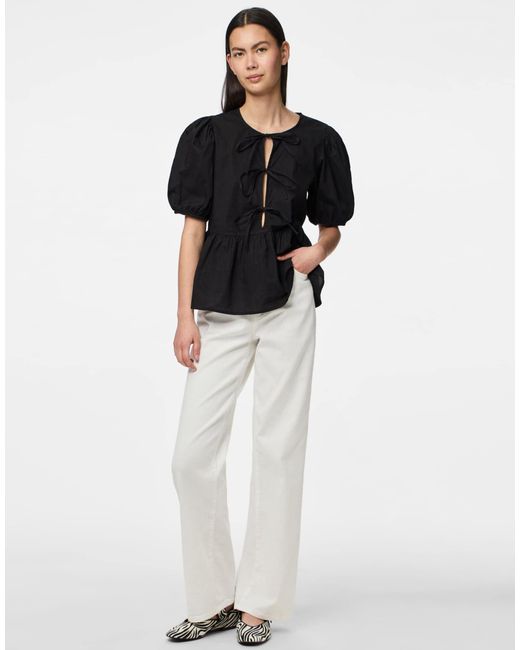 Top à manches bouffantes Pieces en coloris Black