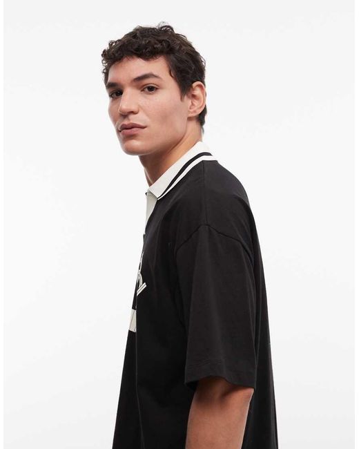 ASOS Black Boxy Oversized Polo With Soccer Graphics for men