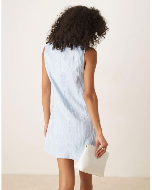 Robe courte à nœuds contrastants Ghospell en coloris Natural