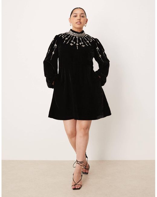 capri floral black sleveless mini dress Women's Sleeveless Floral Tiered Mini Dress in Black main image 0