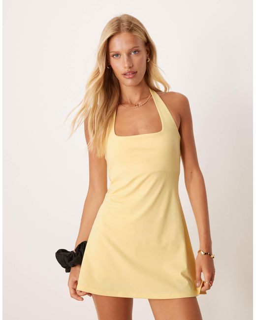4505 Active Halter Neck Tennis Dress With Under Shorts in Yellow | Lyst