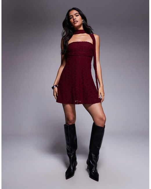 The Frolic Red Exclusive Lace Ruched Bust Detail Bandeau Flippy Hem Mini Dress With Scarf Detail