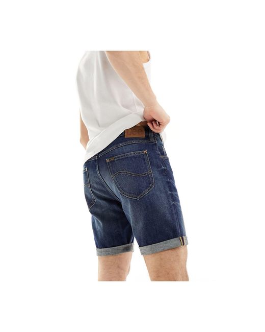 Rider - pantaloncini di jeans slim lavaggio scuro di Lee Jeans in Blue da Uomo