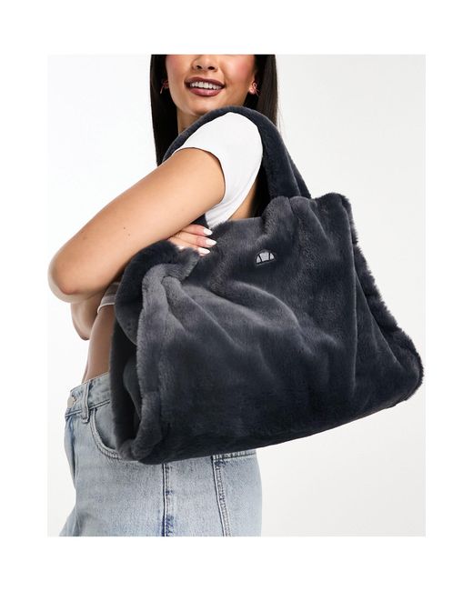 Ellesse Limos Faux Fur Tote Bag in Black Lyst UK