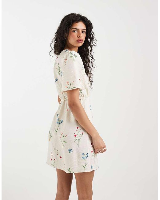 Vero Moda Natural Flutter Sleeve Wrap Front Mini Dress