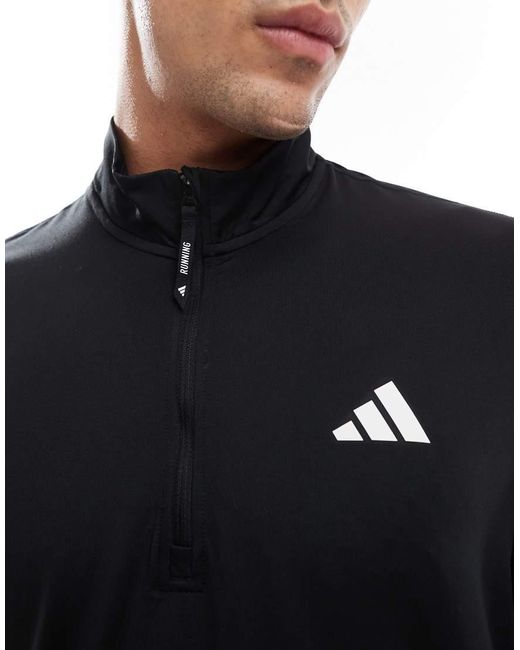 Adidas Originals Blue Adidas Training Own The Run 1/4 Zip Top for men