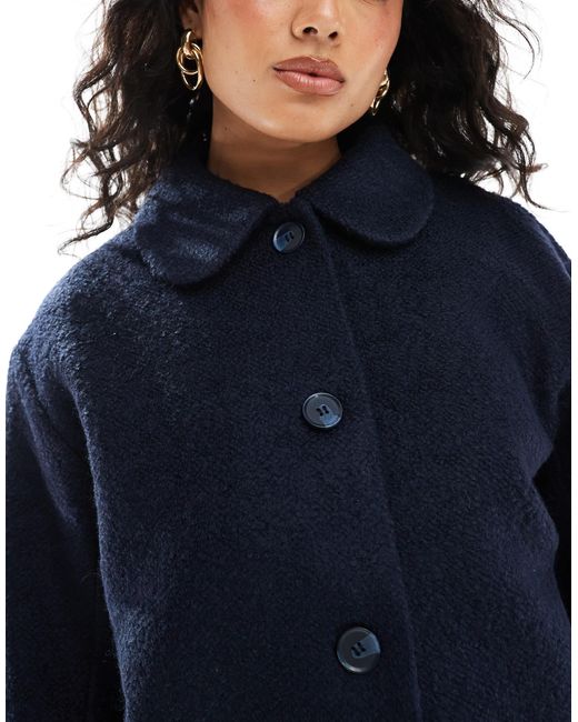 Monki Blue – mantel aus teddyfell