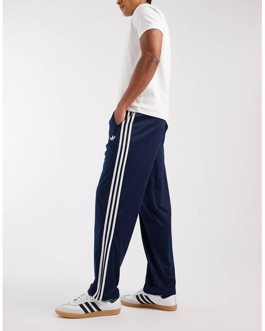 Adidas Originals Blue Firebird Track Pants for men