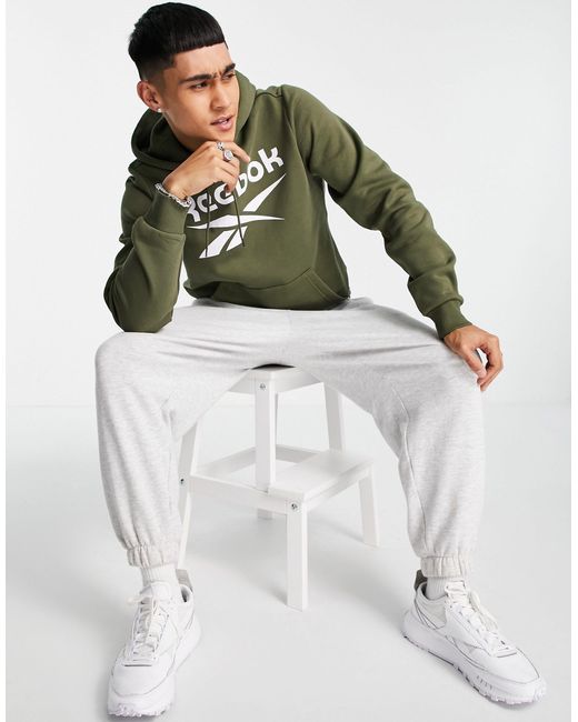green reebok jumper
